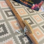 This flute has 6 holes for a greater range of playing ability. Prone towards more Celtic/European sway.