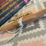 Hand signed with my signature, year made and the Pretty Echo business name. The eagle head shaped reed piece is tied down with soft deerskin lace.
